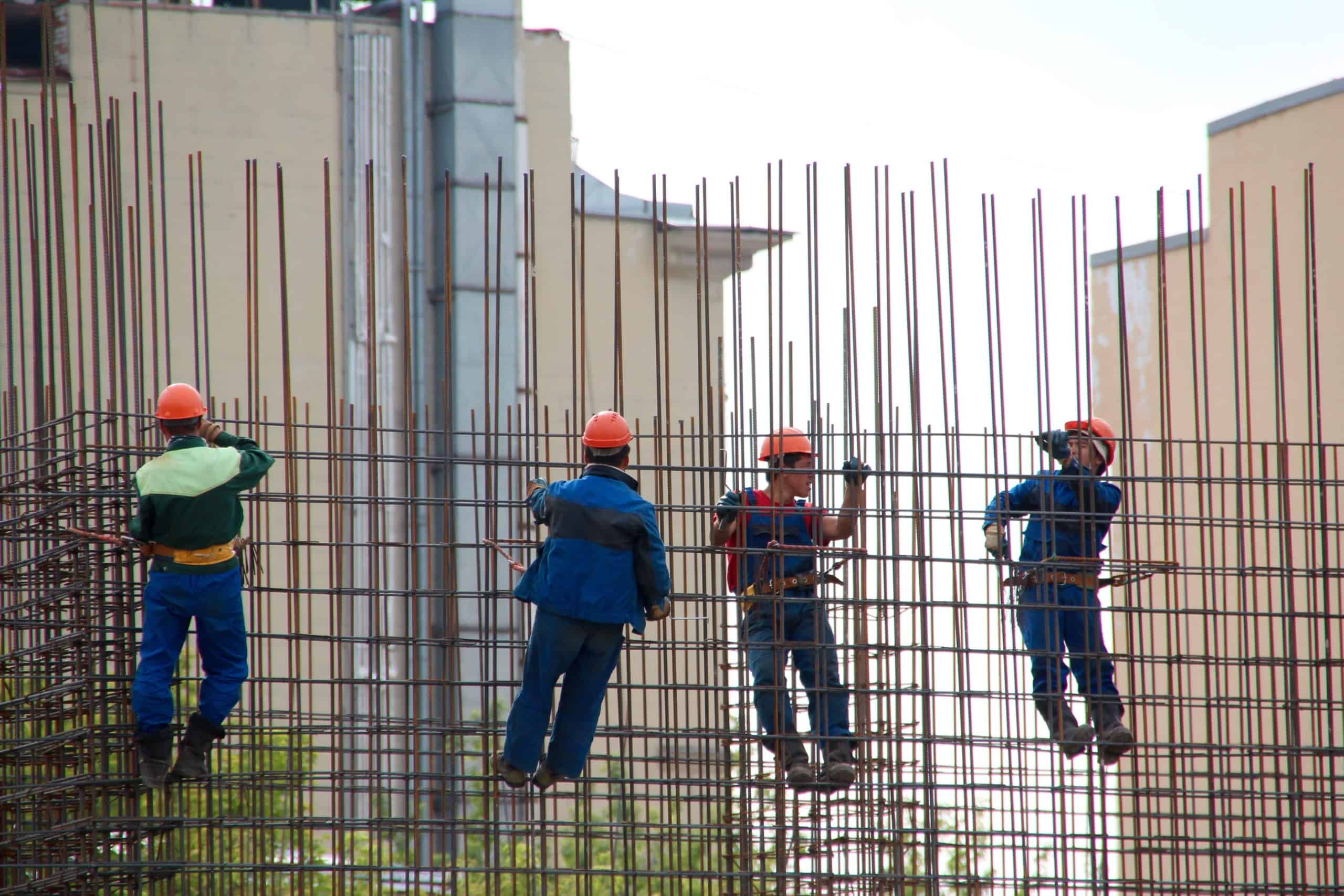 Workers on rebar stock image