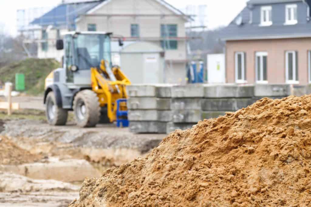 Front end loader on residential site