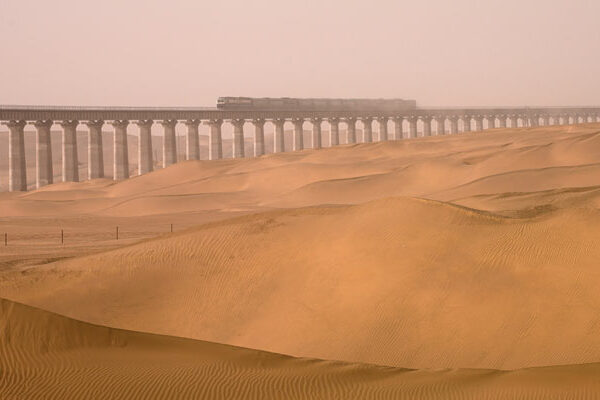 china opens first high speed train around largest desert CZMIHf - Railway Corridor Built Around The Largest Desert In China