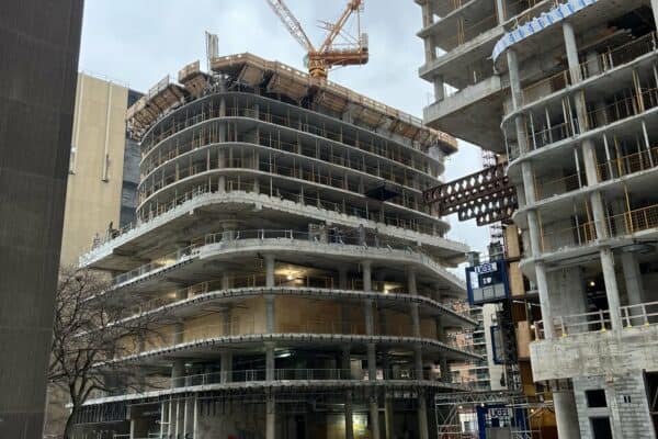 Construction Progress Reveals Variety of Towers at Artists' Alley