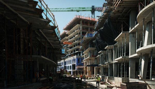Clark tops out first of 3 towers at Washington, DC, apartment project