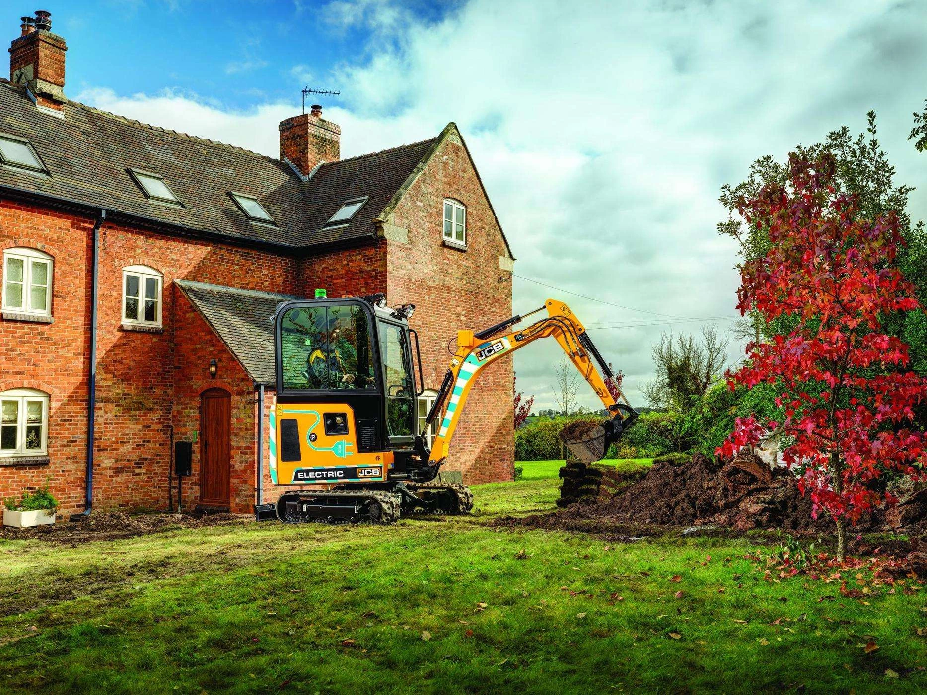 JCB 19C-1E's new cab for all-weather mini excavator